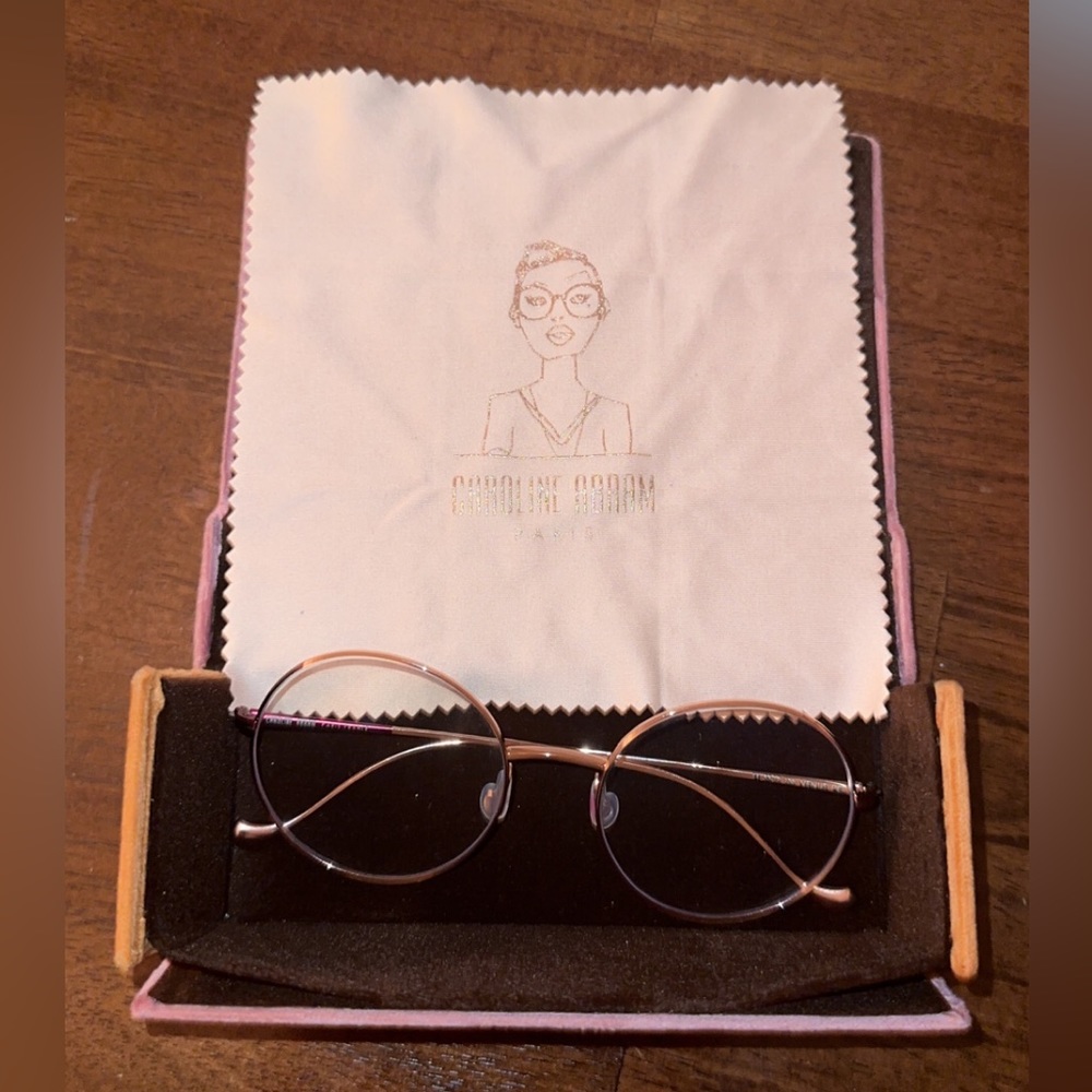 Caroline Abram circular eyeglasses.